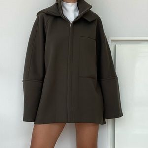 Green coat from Concept Korea